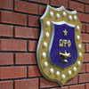 “Twenty-One“	Purple and Gold Shield